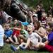 5-year-old Jake Williams of Ann Arbor screams as a Tyrannosaurus roars during the Dinosaur Petting Zoo by Erth in the lawn of the Power Center during the Ann Arbor Summer Festival June 29.
Jeffrey Smith | AnnArbor.com